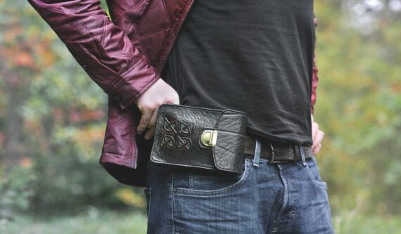 Black leather belt bag with celtic cross