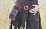 This leather belt is about 80mm wide. Belt has several eyelets that can be used for hanging the belt bag and other items. In this case buckle has been attached on the belt. 