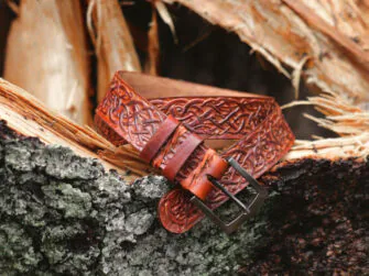 Carved brown leather belt