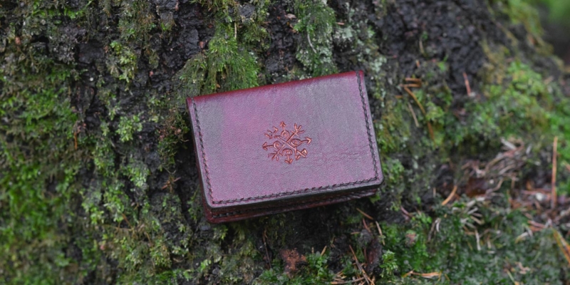 Leather card case, decorated by runes