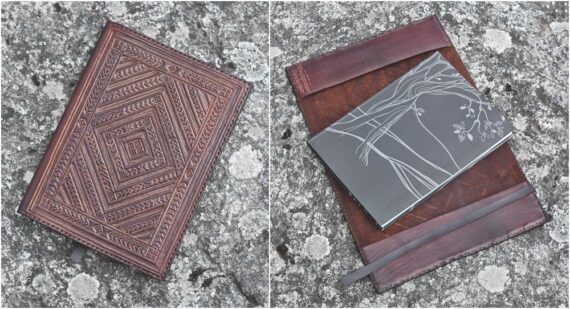 Leather notebook covers with carvings