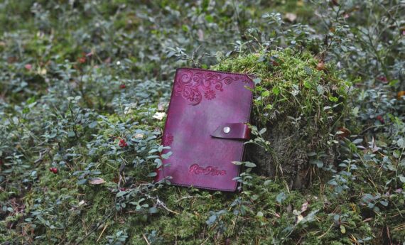 Red notebook covers with floral carvings