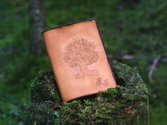 Leather book covers with hand carved oak tree