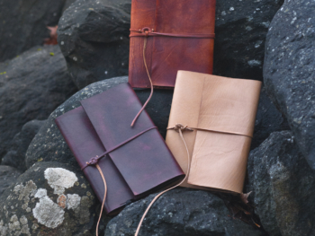 Notebook covers with a strap