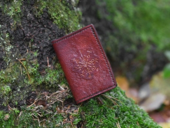 Leather card case, decorated by runes