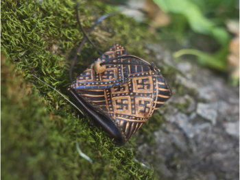 Dark brown coin pouch with swastika