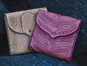 Leather small wallets with pattern.