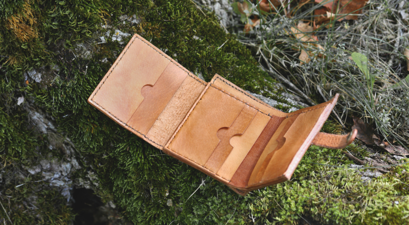 Leather wallet with triskele