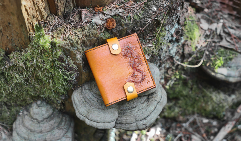 Yellow leather wallet with geko image