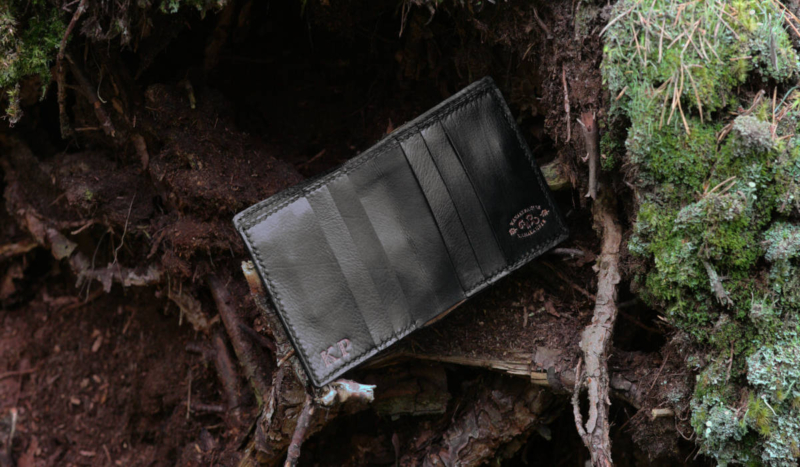 Small black leather wallet with celtic knot