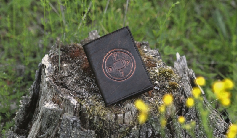 Leather wallet with carved runes