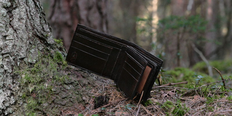 Wide leather wallet with carved oak tree